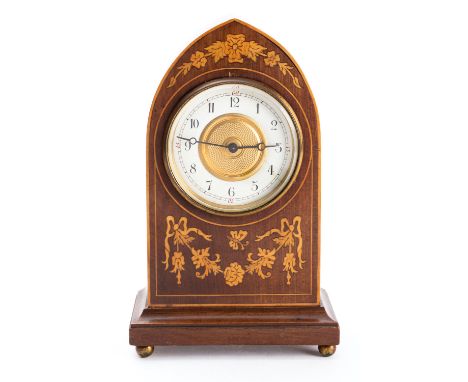 An Edwardian lancet mantel clock and metronome the clock having an eight-day duration timepiece movement with a platform cyli