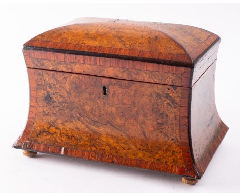 A Regency burr walnut and crossbanded tea caddy, early 19th century; of waisted rectangular form, with domed top; on later tu