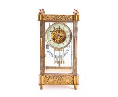 A mid-Victorian French four-glass mantel clock having an eight-day duration movement striking the hours and half-hours on a g