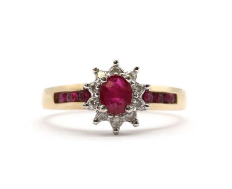 A 9ct gold ruby and diamond cluster ring, common control mark, 2.94g.Finger size OSurface marks/scratches to mount.Surface re