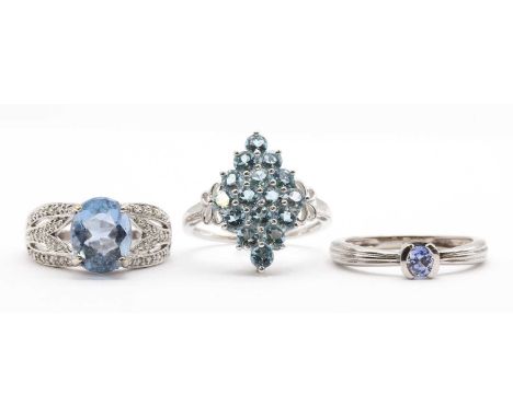 Three 9ct white gold rings,comprising a blue topaz cluster ring, a colour change fluorite and diamond ring, and a single ston