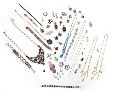 A collection of silver gem-set jewellery,to include a ruby set ship's wheel charm, a sapphire set heart pendant, multi-gem se