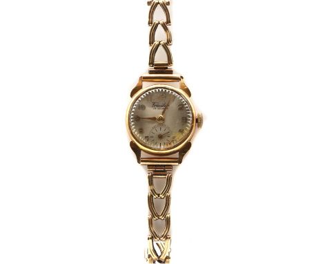 A ladies' gold Precilux mechanical bracelet watch,with a silvered dial and Arabic numerals, the case back marked 18k 0.750, t