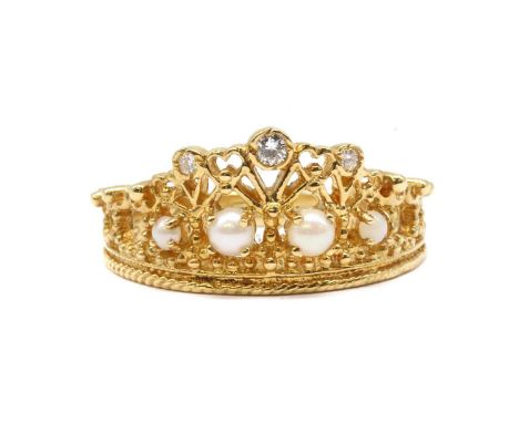 An 18ct gold 'Princess Diana Tiara Ring', by Stuart Devlin for Franklin Mint, the ring modelled as a pierced tiara, set with 