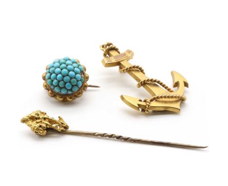 A Victorian 9ct gold hollow anchor brooch, pin deficient, Birmingham 1897, 40mm long, 2.39g,together with a gold nugget stick