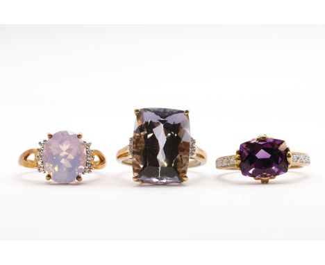 Three 9ct gold rings,comprising two amethyst and diamond rings, and a rose quartz and diamond ring, all hallmarked Birmingham