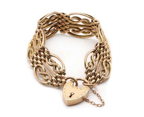 A 9ct gold gate bracelet,with plain and engraved links, to heart shaped padlock clasp, Birmingham 1909, 23.91gSurface marks/s