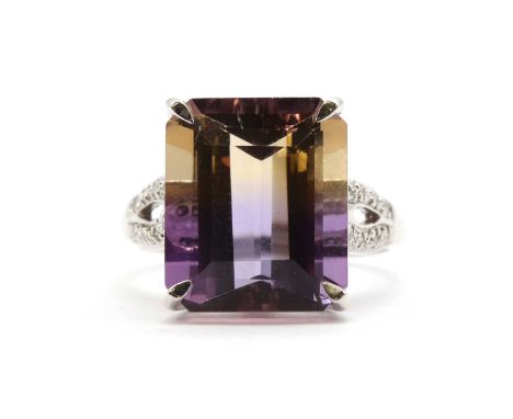 A 9ct white gold ametrine and diamond ring, with an emerald cut ametrine, approximately 14 x 12mm, claw set to split shoulder
