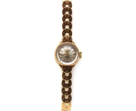A ladies' 9ct gold Rotary mechanical bracelet watch,a round case with a silvered dial and baton hour markers, to integral cre