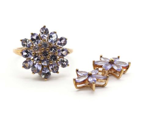 A 9ct gold tanzanite cluster ring, Birmingham, cluster 16.0 x 17.5mm,together with a 9ct gold tanzanite floral cluster pendan