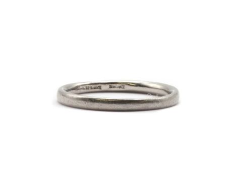 A platinum court section wedding ring, 1.9-2.0mm wide, 2.78g.Finger size MSurface marks/scratches.Width of ring varies slight