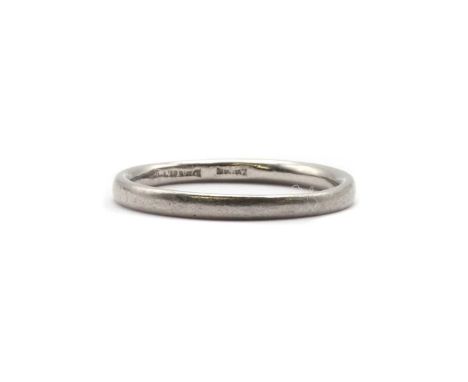 A platinum court section wedding ring, 1.9-2.0mm wide, 2.78g.Finger size MSurface marks/scratches.Width of ring varies slight