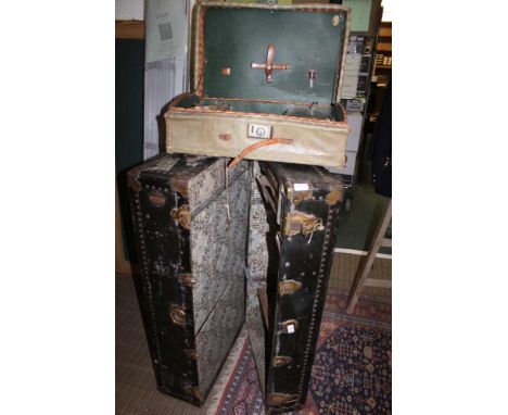 A PART FITTED WOVEN WICKER PICNIC HAMPER together with a part fitted travelling wardrobe, bearing the label 'Neverbreak Trunk