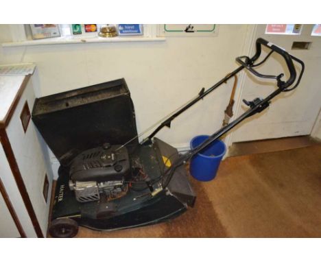 A HAYTER BRANDED PETROL DRIVEN LAWN MOWER with grass collection box, powered by a Briggs &amp; Stratton Harrier 56 engine 