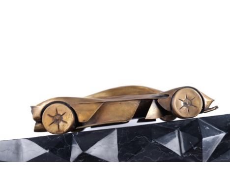 Hand-formed brass Aston Martin Valkyrie sculpture by International artist Phillip Dutton-White.Brass sculpture of an Aston Ma