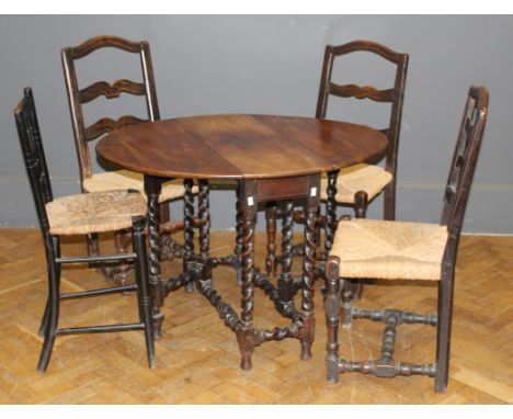 A 19th century mahogany drop flap gateleg table, raised on barley twist and block supports. 70 x 85 x 104cm (open) together w