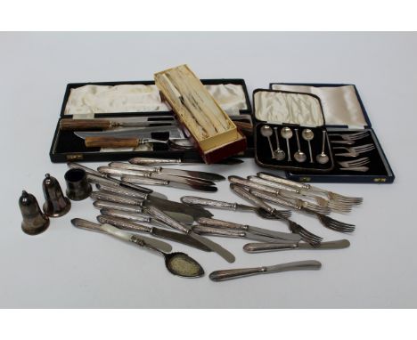 A collection of Mappin and Webb fish cutlery and butter knives, a set of cased EPNS seal end tea spoons, a set of bone handle