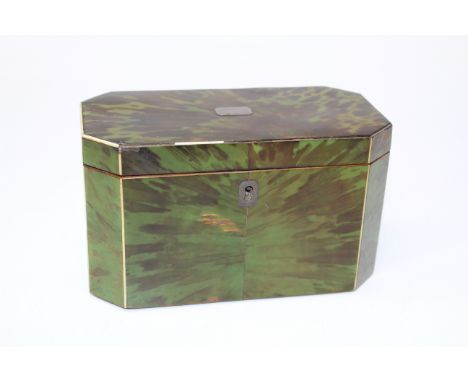 A George III green stained tortoiseshell and ivory strung tea caddy. The hinged cover with vacant silver cartouche, the inter