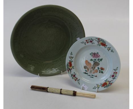 A 19th century Chines Famille Rose florally decorated plate, 23cm diameter, together with a Celadon glazed bowl, 33cm ( at fa