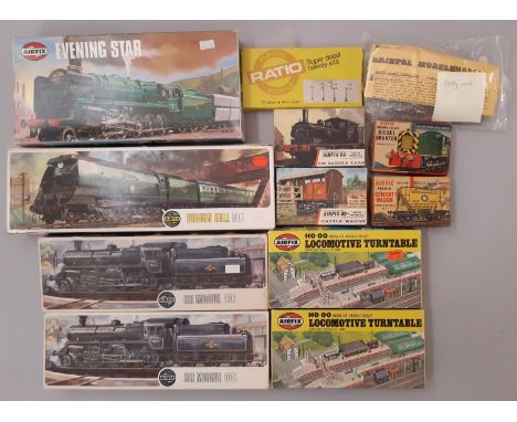 Ten boxed 00 scale model railway kits by Airfix including locomotives Biggin Hill, BR Mogul, Evening Star, wagons, turntables