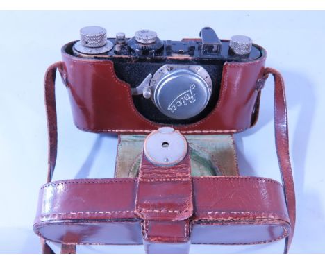 Photography Interest - A Leica camera I (Luxus) number 40864, 1930, together with leather case