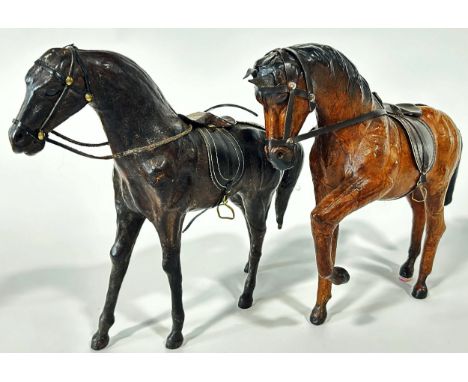 Two leather model horses both 29cm high  approximately (small faults) 