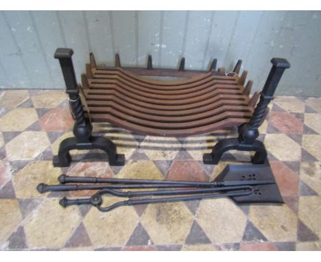 A heavy gauge Iron fire basket and loose dogs together with a set of fire irons 