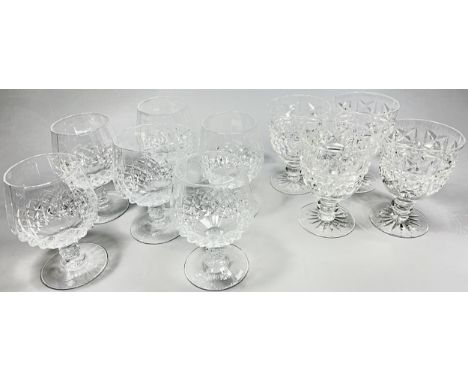 Twelve Waterford crystal wine glasses, six red wine and six white wine, 19.5cm and 18cm respectively, together with six brand