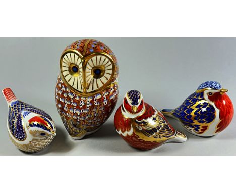 A collection of Royal Crown Derby Imari birds to include an Owl, a Robin and a Firecrest with gold stoppers and one other wit