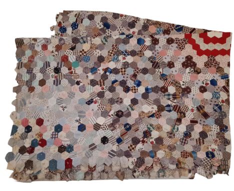 A vintage patchwork panel of hand stitched printed cotton hexagons, unlined and with unfinished edges 225x 160cm (AF)