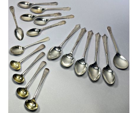 A selection of silver tea and coffee spoons, four mustard, and a cased set of six teaspoons, (27) 12.9 oz