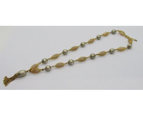 Vintage 14ct bi-colour necklace with alternating wrythen and spherical links and tasselled drop, maker 'MG', London 1958 impo