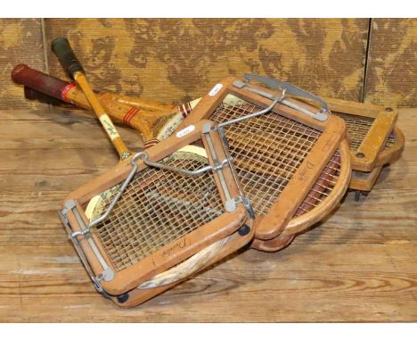 Two vintage wooden tennis rackets including a Dunlop Maxply example and further squash racket (all with stretchers)