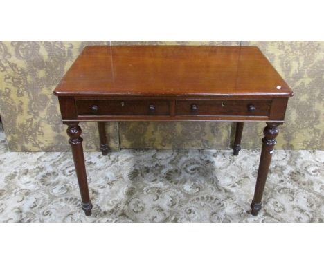 A 19th century mahogany writing table/desk fitted with two frieze drawers raised on turned supports, 67 cm high x 92 cm x 61 