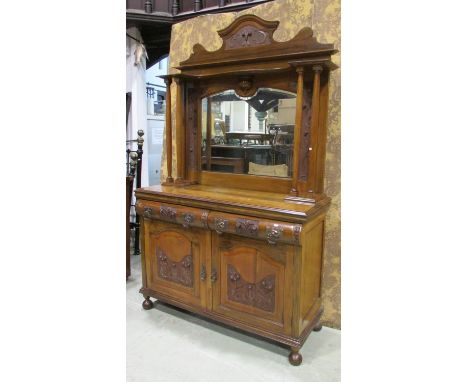 An Edwardian walnut mirror back sideboard with bevelled edge plate carved foliate detail and anodised handles, approx 200cm h