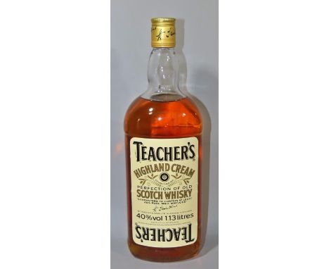 A large vintage bottle of Teacher’s Highland Cream Scotch Whisky (1.13 litres). 