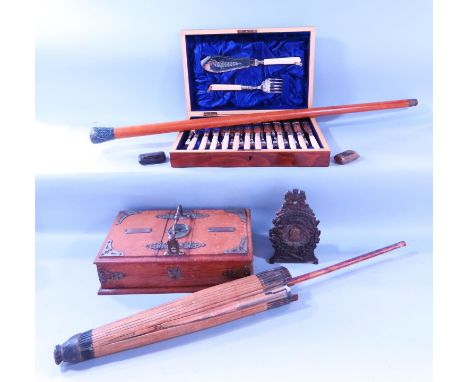 A Malabar cane with a silver plated top, a double ended cigar and cigarette box, a paper parasol, a cased set of fish knives 