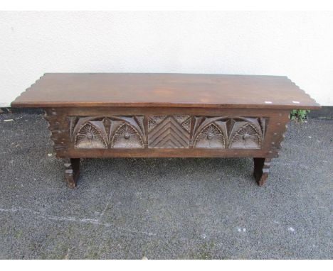 An old English style six plank coffer with deep carved detail, 44cm high x 120cm x 33cm