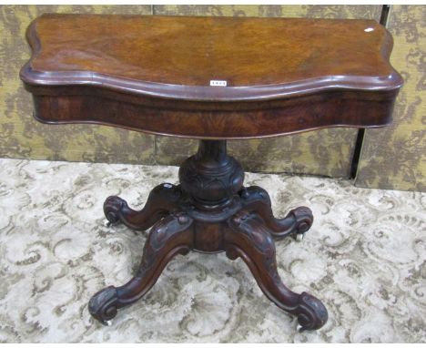 A Victorian figured walnut veneered fold over top card table with serpentine moulded outline, 69 cm high x 90 cm x 45 cm clos