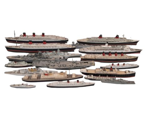 A collection of kit built model ships including naval vessels and an aircraft carrier together with 3 x ship in a bottle from