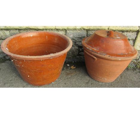 An old terracotta dairy pan and cover with glazed interior together with one other (2) 