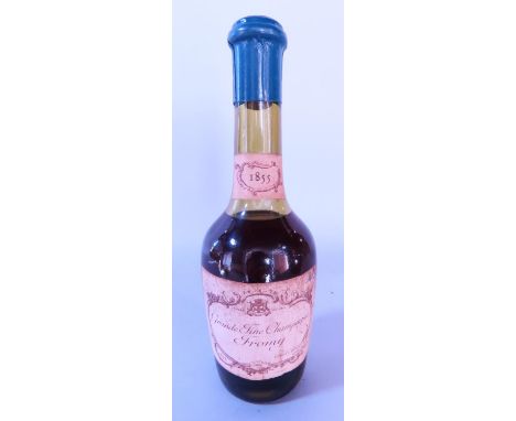 A small bottle of Grande Fine Champagne Fromy Cognac bearing the date 1855 19cm high 