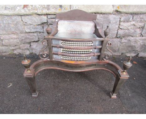 An electric Georgian style fire basket with serpentine front, urn finials and pierced grill, 57 cm high x 67 cm wide (af) (fo