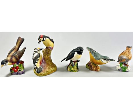 A collection of Royal Worcester and Beswick British Birds in gloss and matt glaze (10) 