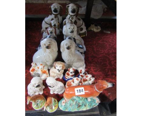 A collection of 19th century and later Staffordshire dogs, mainly Spaniels but including Greyhounds (21)