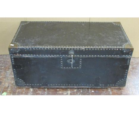 A 19th century camphor wood travelling trunk with overlaid weatherproof leather finish and brass stud work detail, 39cm high 