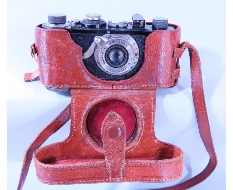 Photography Interest - A Leica camera model I number 2982, 1926/27, together with a leather case