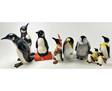 A collection of ceramic Penguins by Beswick in various poses (10) 
