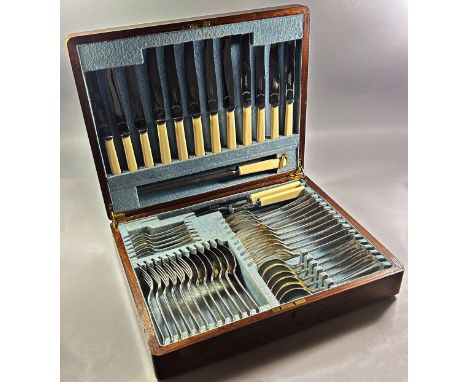 A canteen of silver cutlery for six settings, six main forks, six dessert spoons, six soup spoons, four serving spoons and si