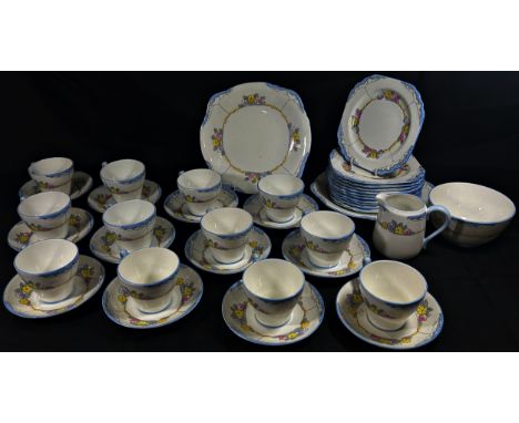 A Heathcote china - 'The Downs' pattern tea set for 12, with cups, saucers, tea plates, two sandwich plates, milk jug and sug